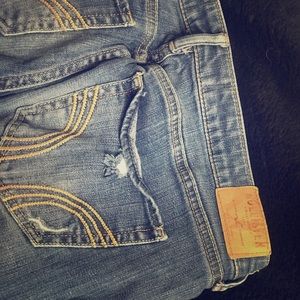 Ripped/ distressed Hollister blue jeans